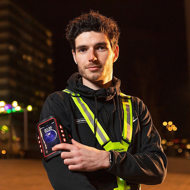 Puhelinpidike käsivarren ympärillä TUNTURI LED Puhelin Sport Käsivarsinauha, keltainen